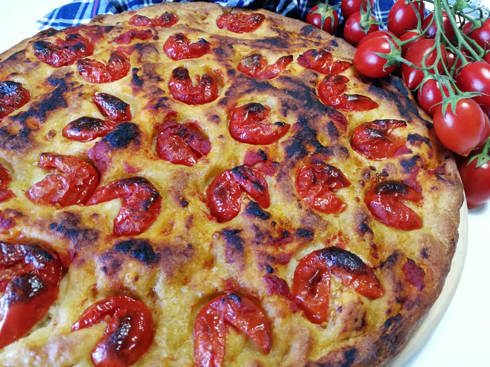 Focaccia barese with tomatoes and olives